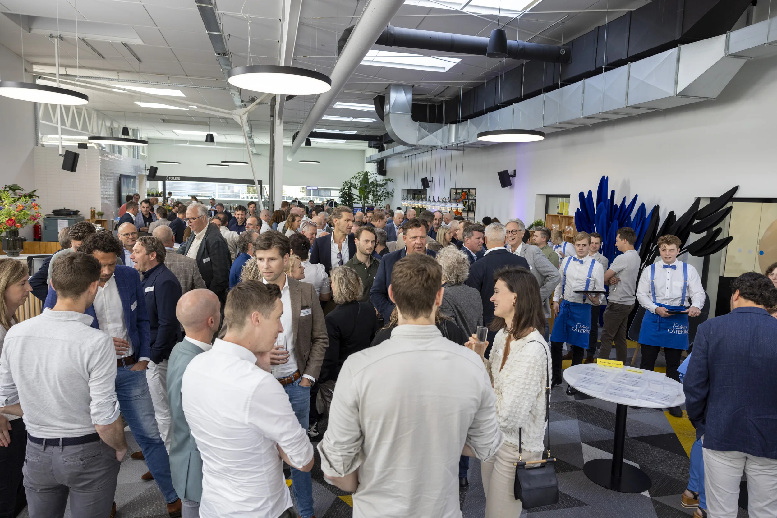 Volle zaal tijdens een bijeenkomst van de Bouwsociëteit Zuidoost Brabant